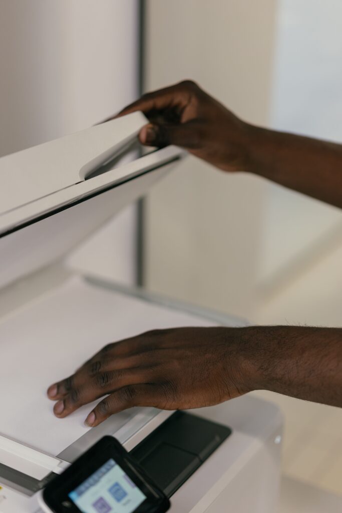 Scanning a paper invoice to digitize financial documents for automated data extraction